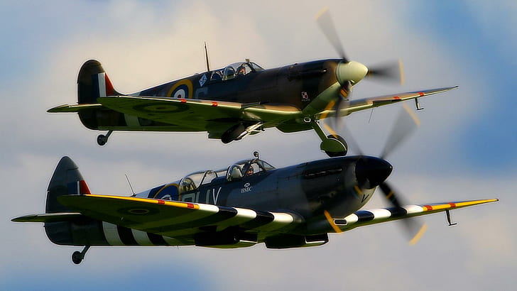 Spitfires, two gray-black-and-green airplanes, glen angus, victory gal