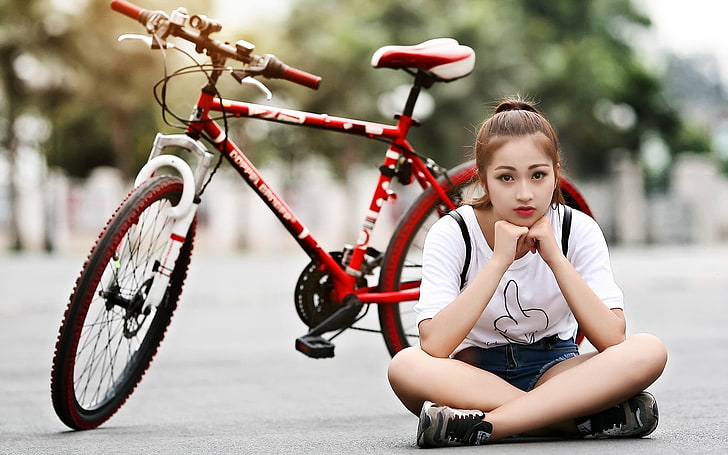 women with bicycles, Asian, model, sitting, transportation
