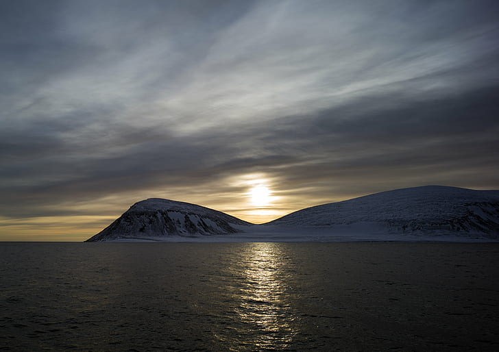 photo of sunset under mountains, svalbard, svalbard, leica, walrus