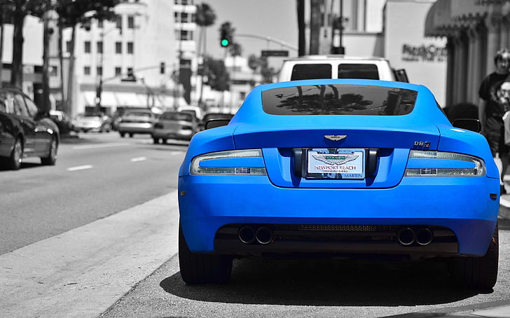 selective color photography of sports car beside road, Aston Martin