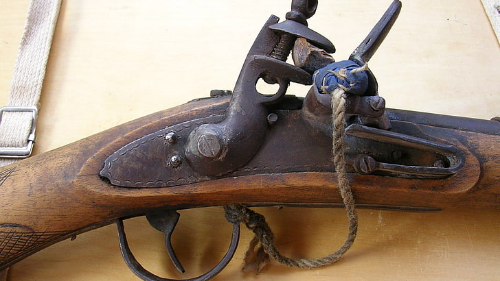 flintlock rifle, no people, metal, close-up, day, rusty, pulley