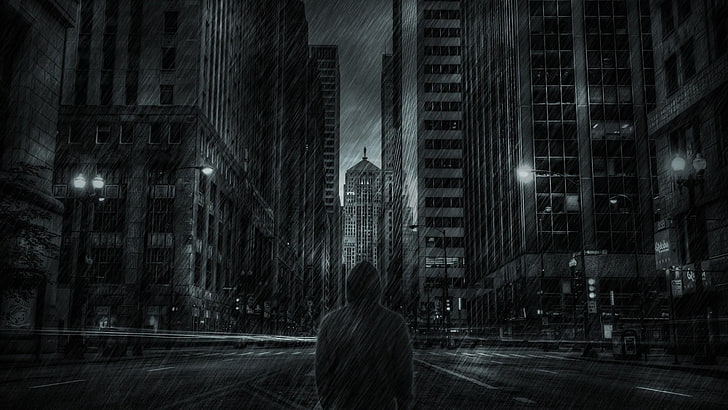grayscale photo of man in front of skyscrapers while raining