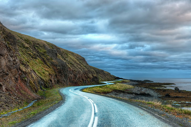 landscape photography of road near mountain and body of water, iceland, iceland