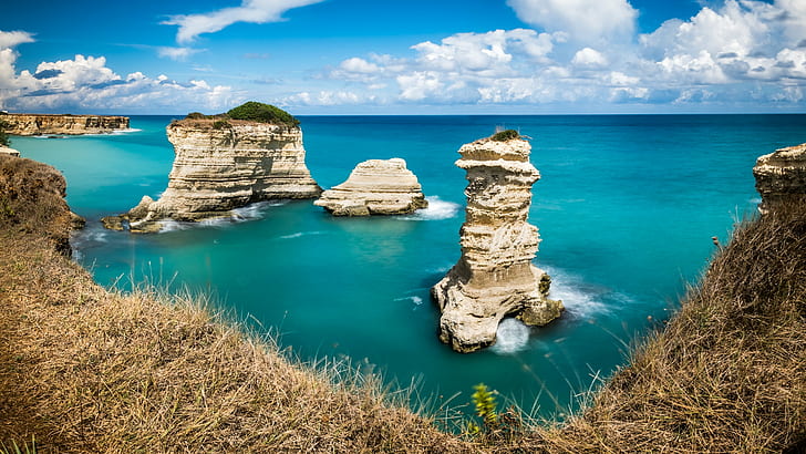 rock monolith surrounded by body of water under blue sky, Torre, puglia, italy, Torre, puglia, italy, HD wallpaper