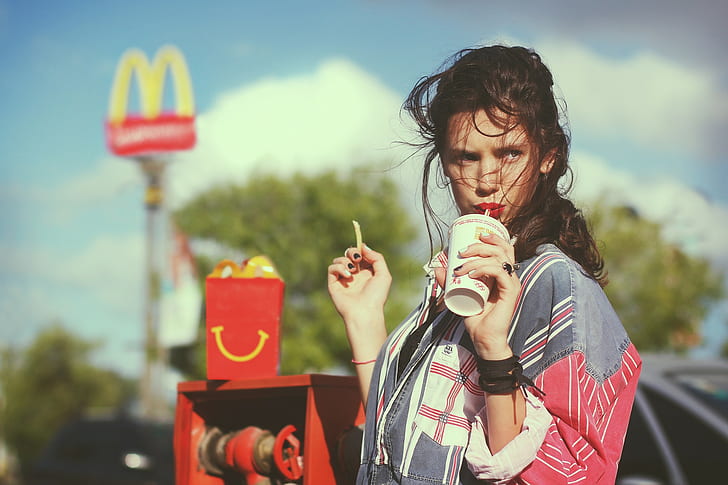 fast food  Fries  red lipstick  hair in face  drink  windy  women  brunette  McDonalds