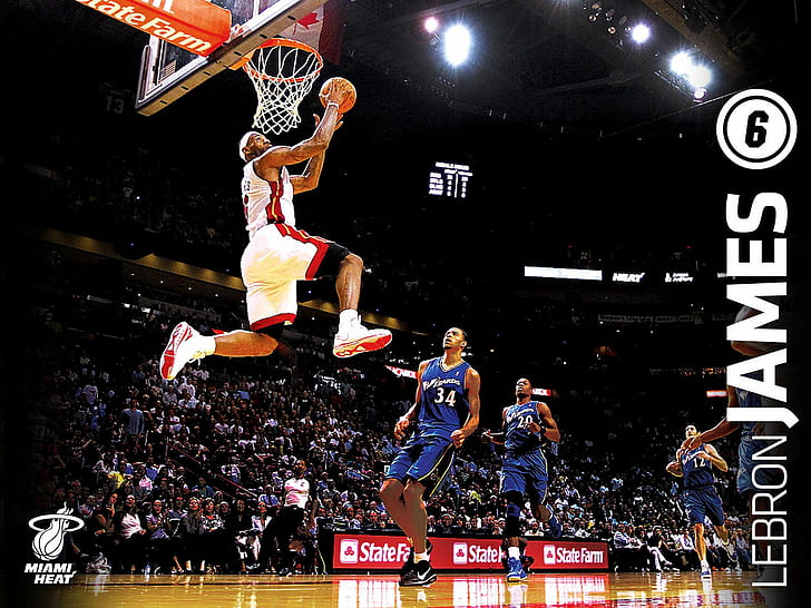 Download Lebron James Soaring High Through the Air on an Epic Slam Dunk  Wallpaper  Wallpaperscom
