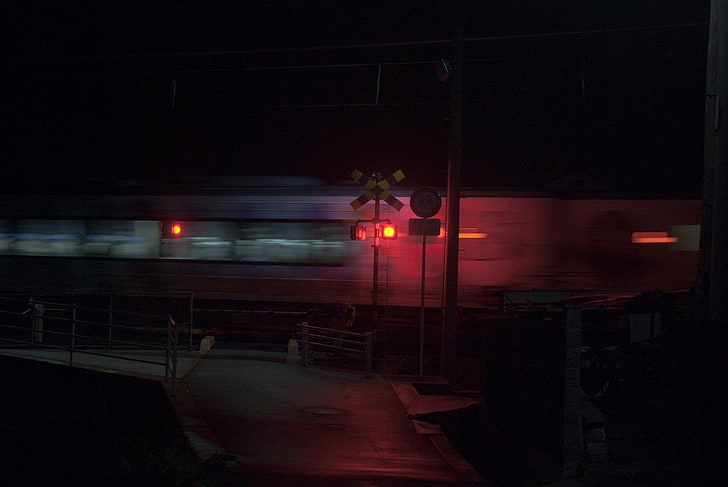 train, railway crossing, vehicle, night, illuminated, transportation