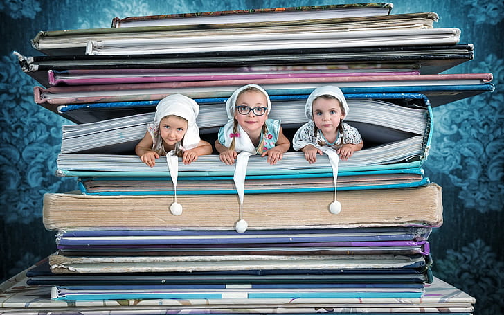 Three cute girls in book, creative pictures, three girls portrait