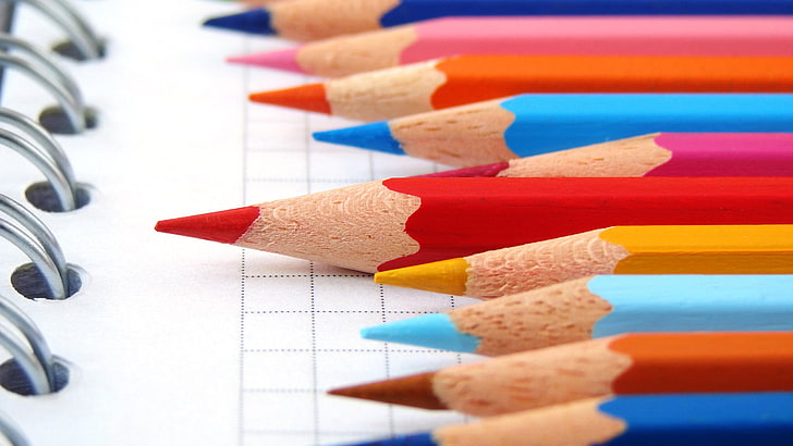 assorted-color pencil lot, selective focus photo of coloring pencils placed on top of book, HD wallpaper