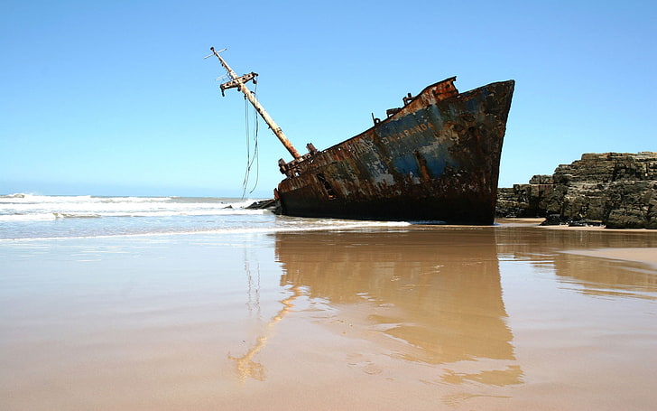 blue and black ship wreck, fragments, rust, mast, coast, beach