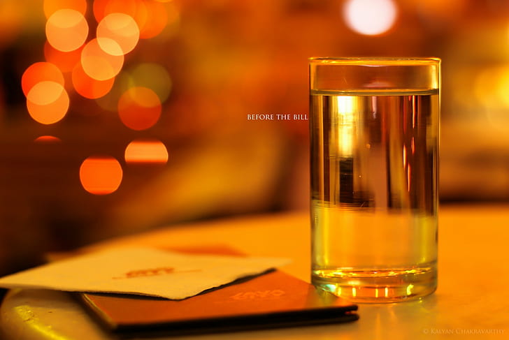 selective focus photography of drinking glass, the bill, color