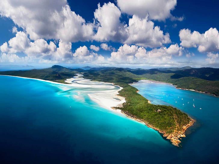 Whitsunday Isls, aerial photo of island and ocean with Columbus clouds