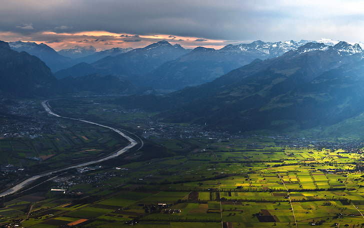aerial photography of village, mountains, landscape, field, clouds