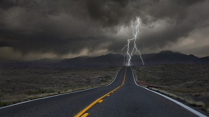 gray and orange road, freeway struck by lightning, clouds, desert