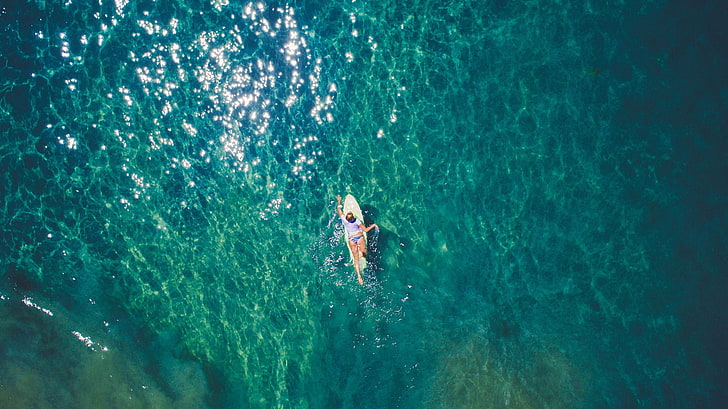 aerial photography of woman on yellow surfboard at sea, nature, HD wallpaper