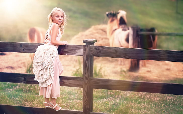 Cute child, little girl, white dress, fence