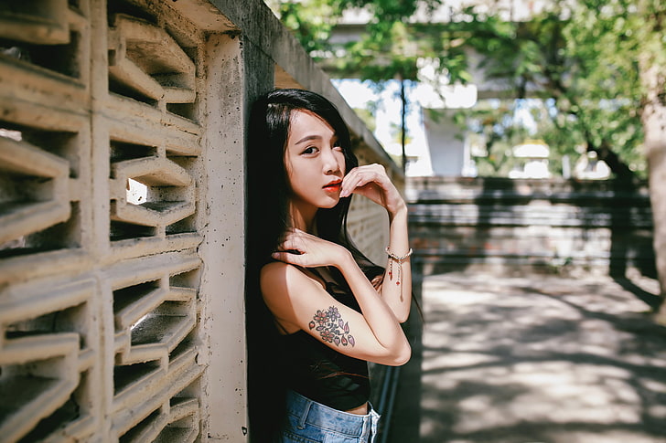 Asian, women, looking at viewer, black tops, jeans, tattoo