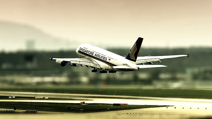 Singapore Airlines airplane, white airplane flying, tilt shift