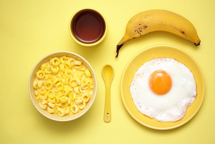 round yellow plastic plate, food, breakfast, bananas, eggs, food and drink