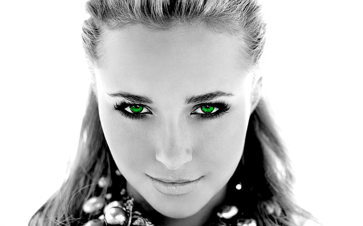 women's green iris, selective color photography of green eyed woman