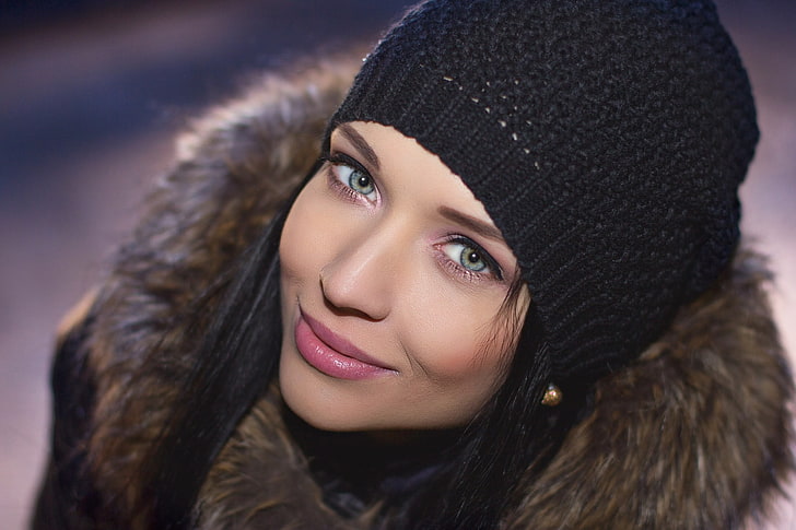 women's black knit hat and fur jacket, Angelina Petrova, face