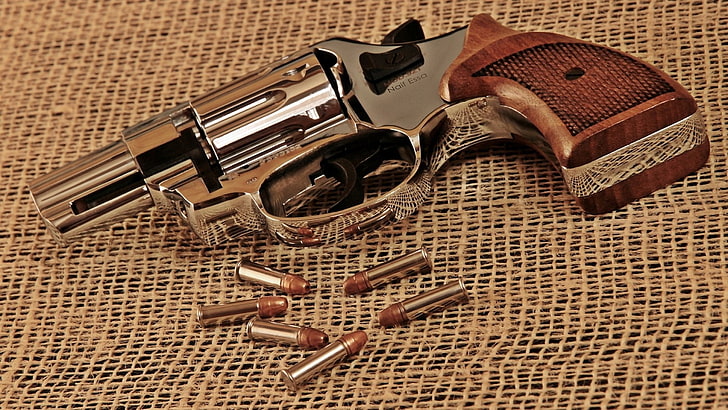 brass-colored and brown revolver pistol with bullets, Weapons