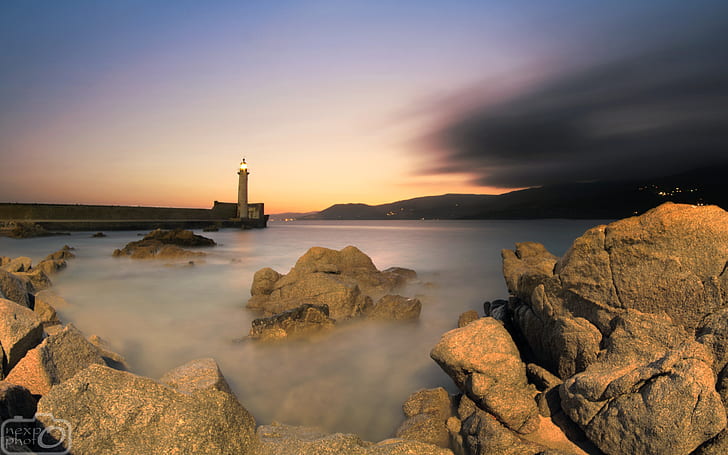 lighthouse, sea, water, sunset, sky, clouds, rock, nature, landscape, HD wallpaper