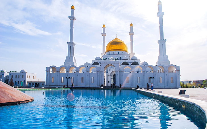 white and yellow 4-minaret mosque, astana, kazakhstan, islam