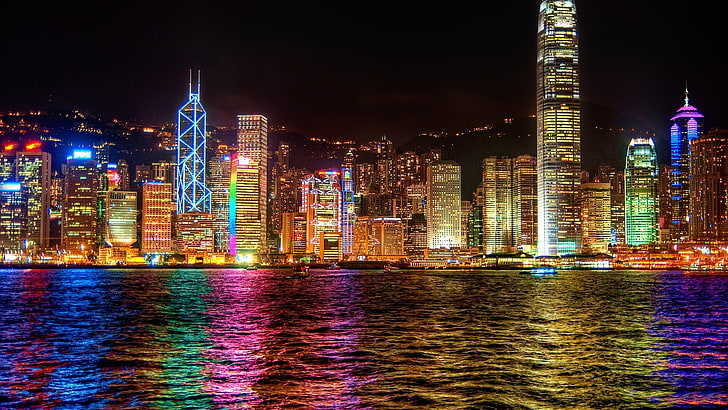 photo of city light near sea during night time, Hong Kong, skyscraper