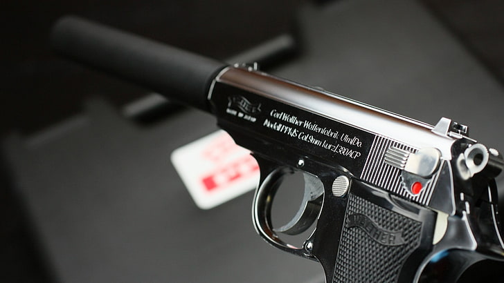 selective photography of black pistol, gun, suppressors, Walther PPK