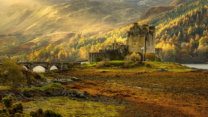 gray castle surrounded with trees, autumn, nature, Scotland, the Eilean Donan castle