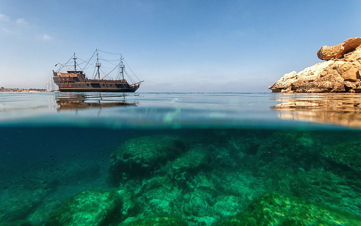 brown galleon ship, sea, rock, split view, water, underwater