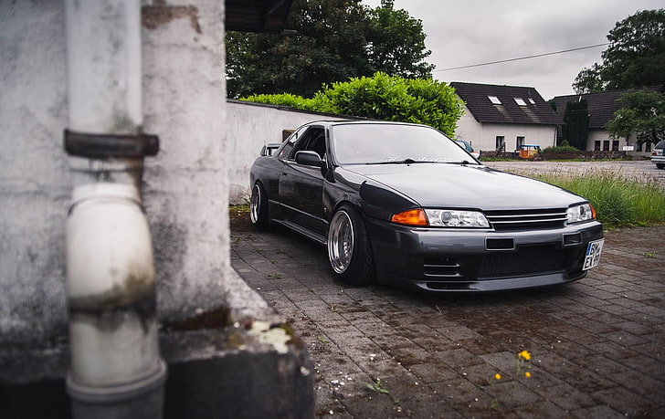 Hd Wallpaper Black Sports Coupe Parked Near White Wall Nissan Skyline Nissan Skyline R32 Wallpaper Flare