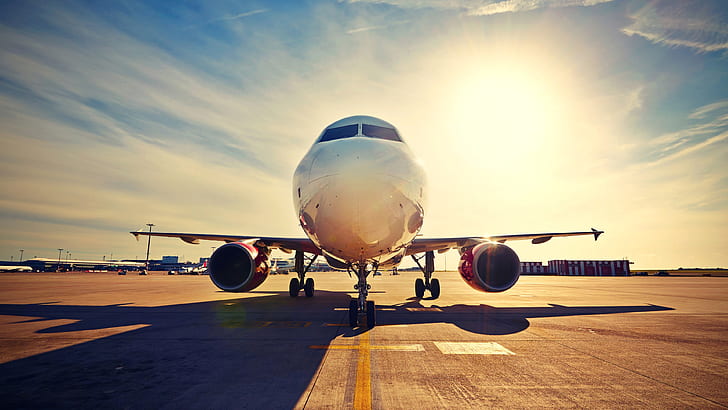 Passenger plane, airport, runway, sun rays