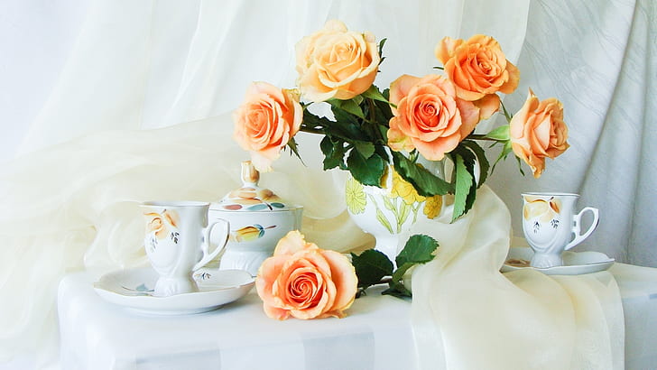 Still Life on the desktop, orange roses, cups, vase