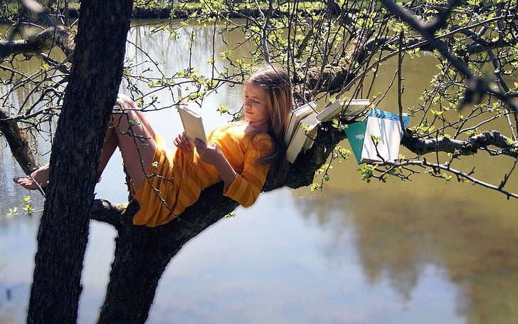 women's yellow long-sleeved striped dress, reading, books, women outdoors