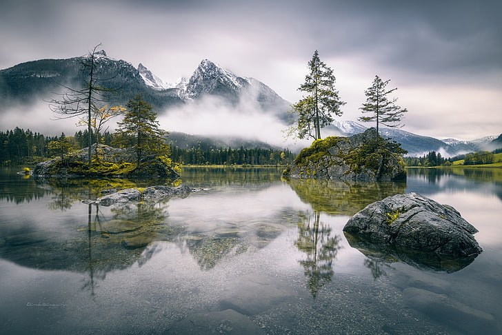 landscape photography of lake near foggy mountain, mountains