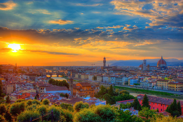 aerial view of high buildings and green trees with sunrise during day time, florence, florence