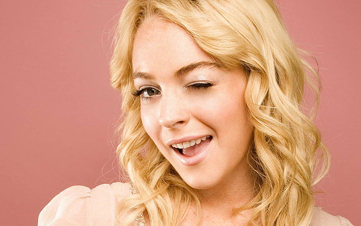 Lindsay Lohan, blond hair, portrait, studio shot, colored background