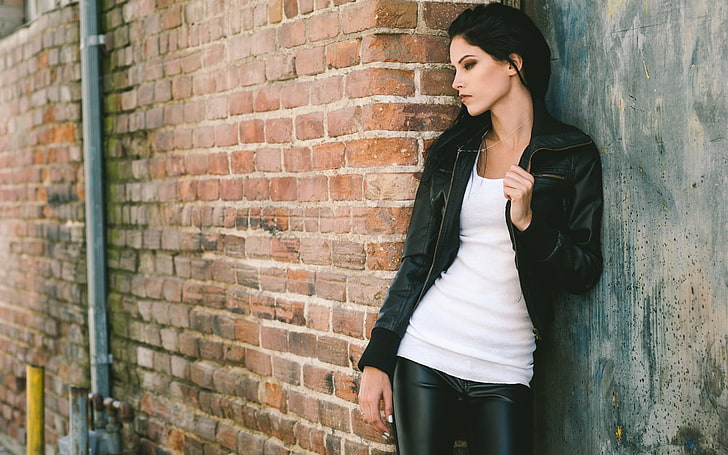 women's black leather zip-up jacket, dark hair, leather jackets