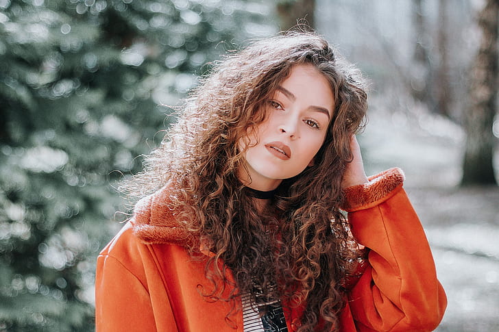 face poses women portrait orange jacket seasons makeup model outdoors fashion curly hair glamour