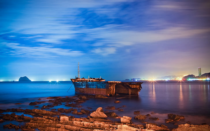 A Wrecked Boat In The Ocean, blue, boats, citylights, coastal, HD wallpaper