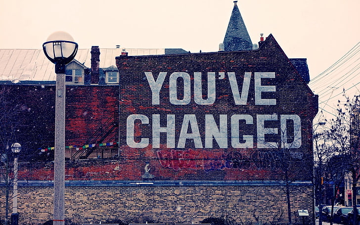 You've Changed wall graffiti, building, street light, typography