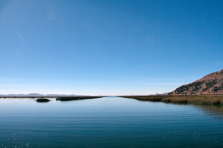 landscape photography of mountain and body of water, lake titicaca, lake titicaca