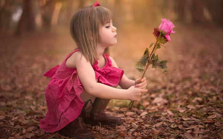 HD wallpaper: Cute little girl holding rose flower | Wallpaper Flare