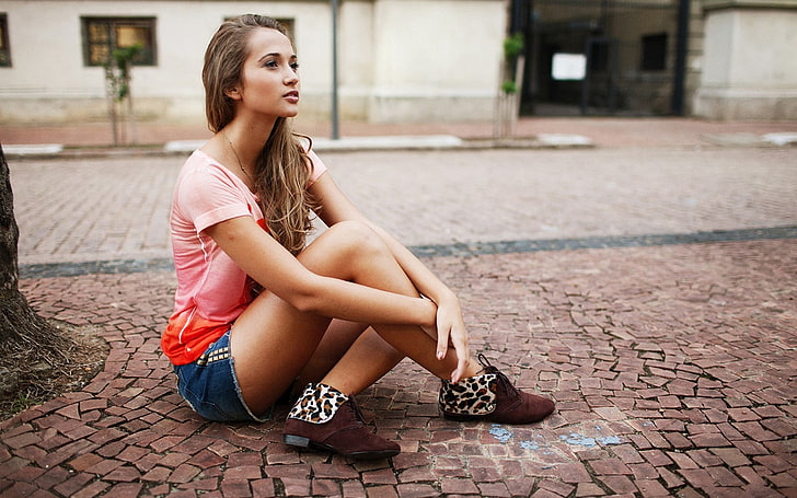woman sitting on brown pavement, women, street, pavements, jean shorts