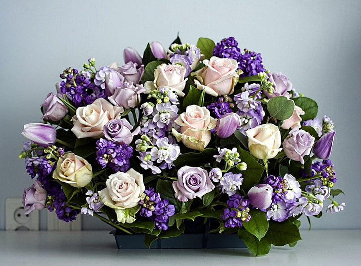 purple and pink flower arrangement, roses, tulips, lucius, leaves