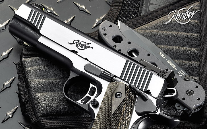 silver and black semi-automatic pistol and pocketknife, weapons