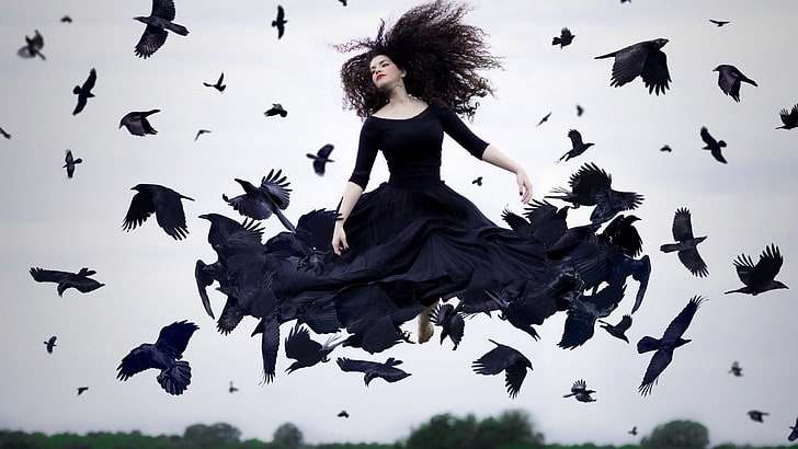 woman in black long-sleeved dress fly with flock of crow, women