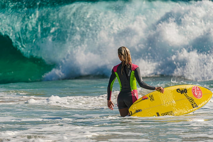 Surfing girl with board, wave board